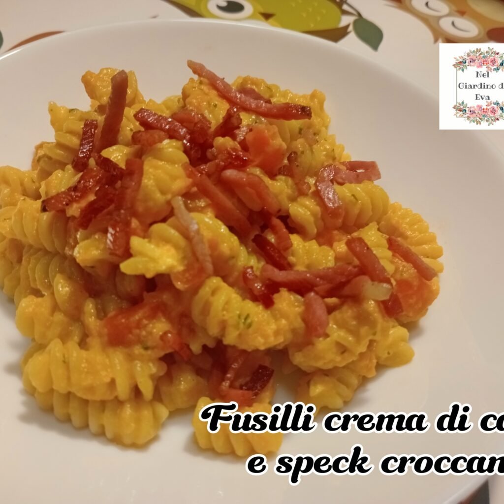 Fusilli con crema di carote e speck croccante